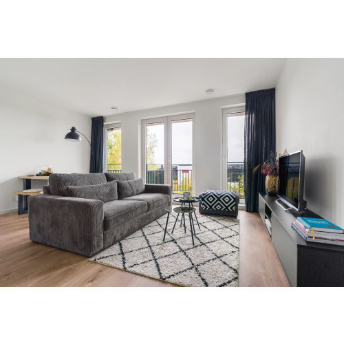 2,5-zits bank met hocker/poef – nette staat – modern grijs afbeelding 2