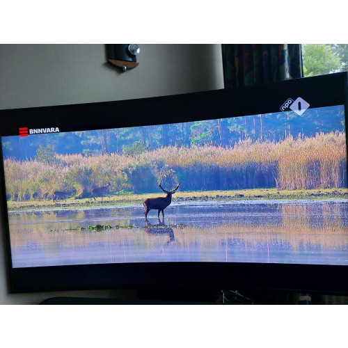 Samsung 55&quot; curved smart TV in nieuw staat, 3,5 jaar oud afbeelding
